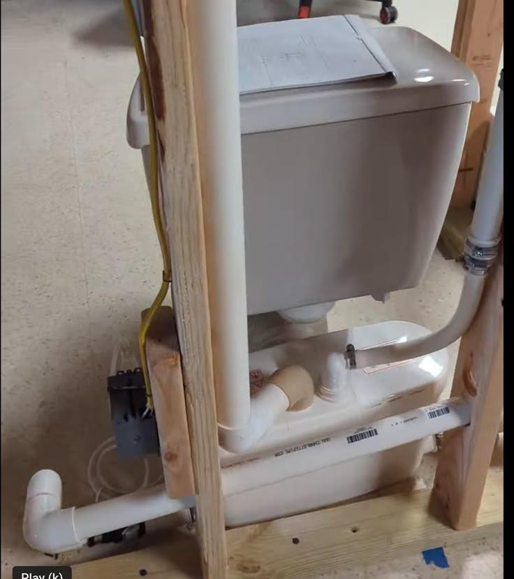 Cover art for How to Install a Saniflo Macerating Toilet in a Basement (Without Breaking Concrete)